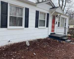brunette-watson-siding-before